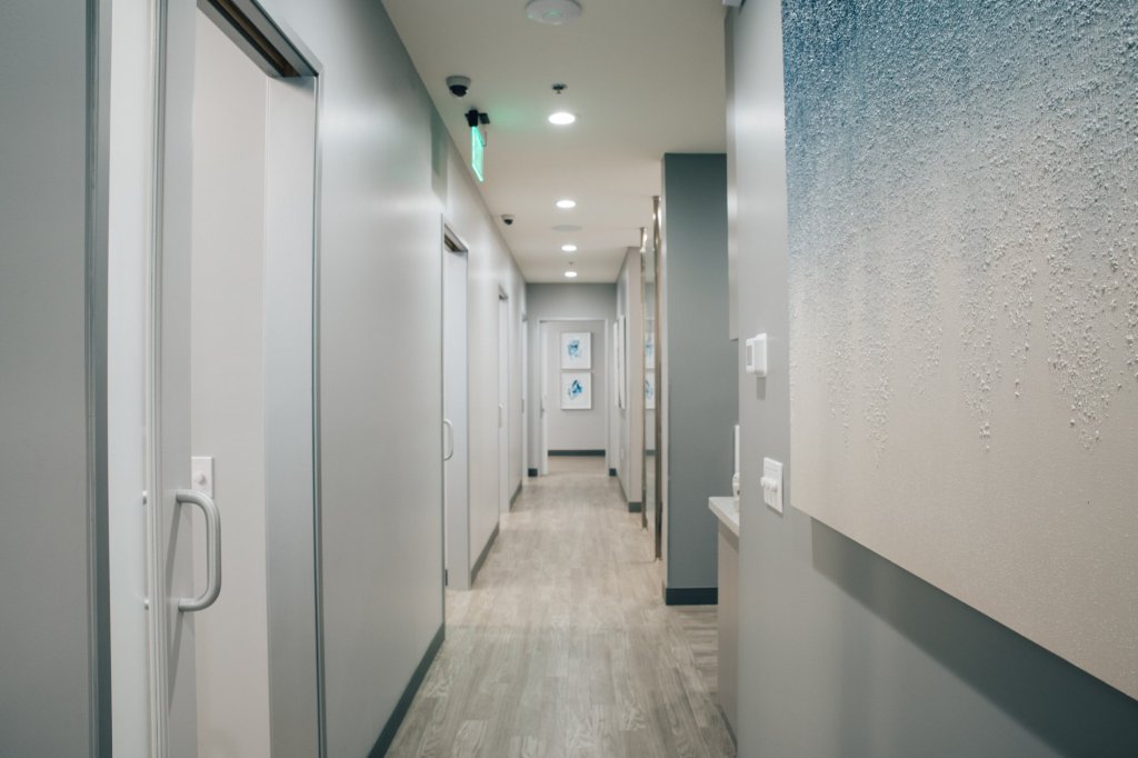 Clean and well-lit modern hallways, Valencia, CA Endodontics office